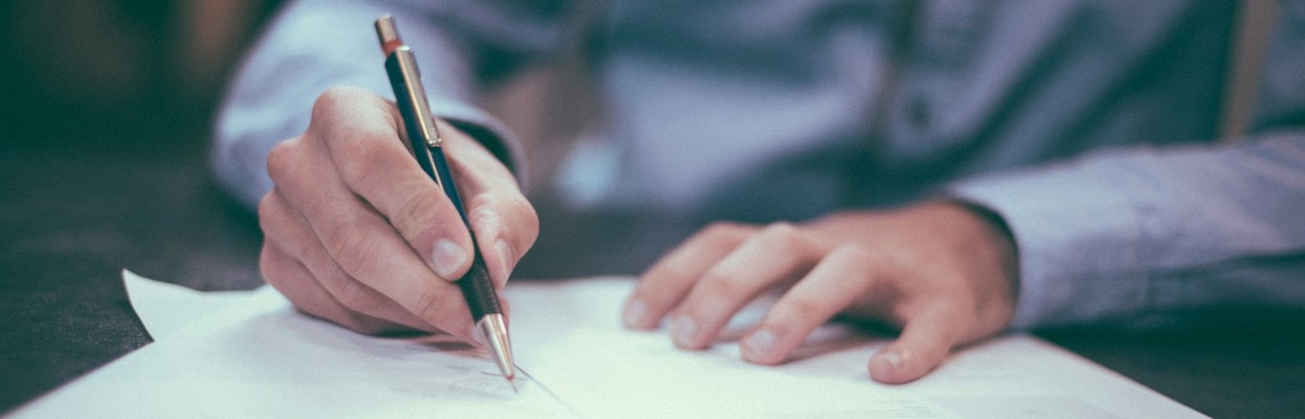 Man signing contract